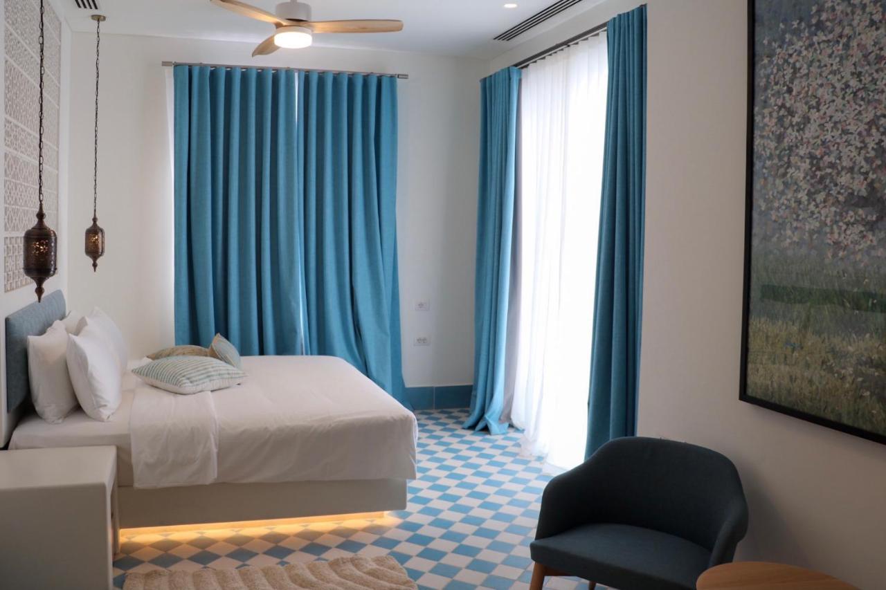 Cloud 7 Residences Ayla Aqaba Exteriör bild A bedroom at the hotel